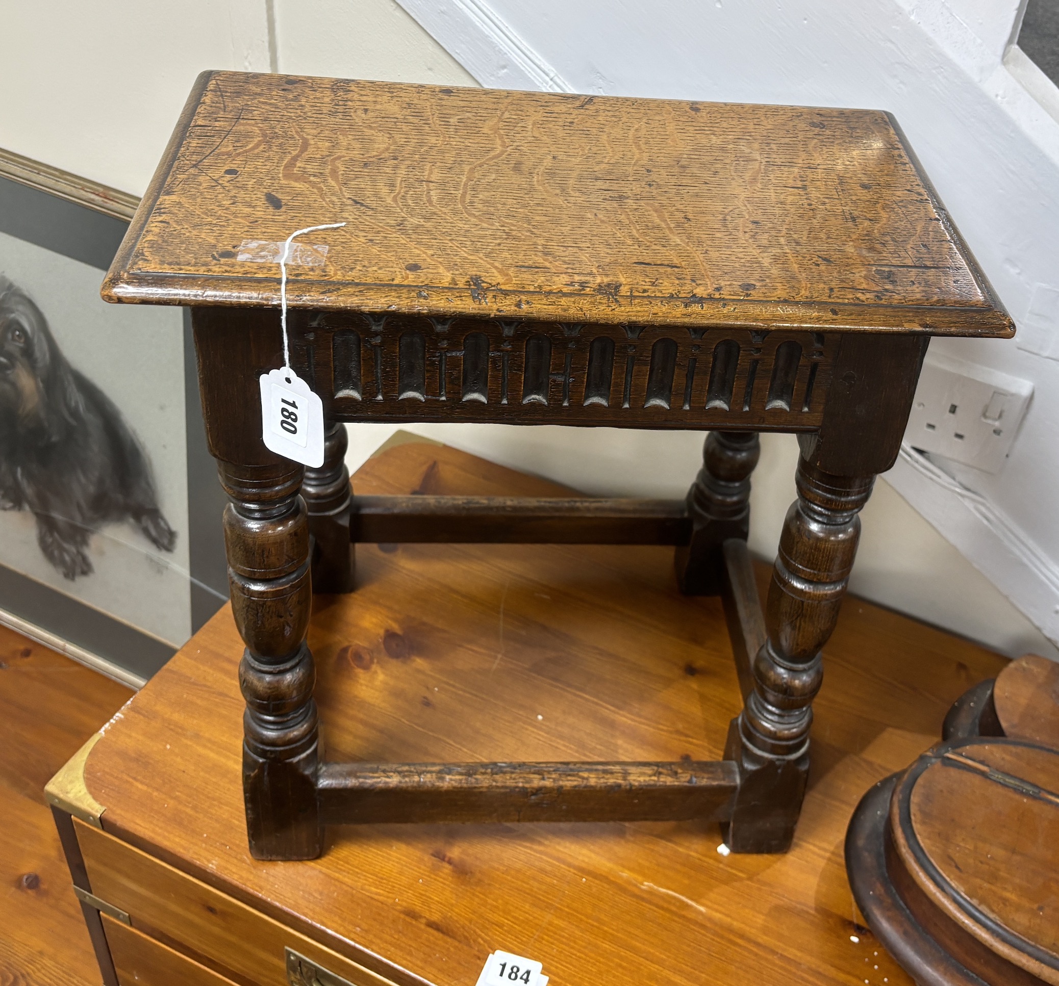 A 17th century style rectangular oak joint stool, width 44cm, depth 25cm, height 44cm